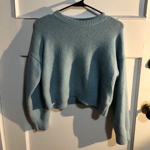 Light blue cozy winter sweater.